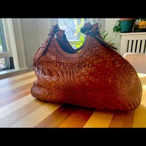 Cole Haan Woven leather medium purse.